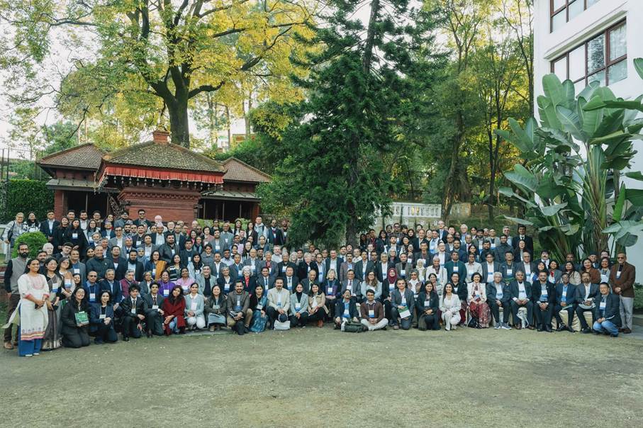 A group of people posing for a photo Description automatically generated